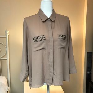 Tan buttoned blouse with studded pockets